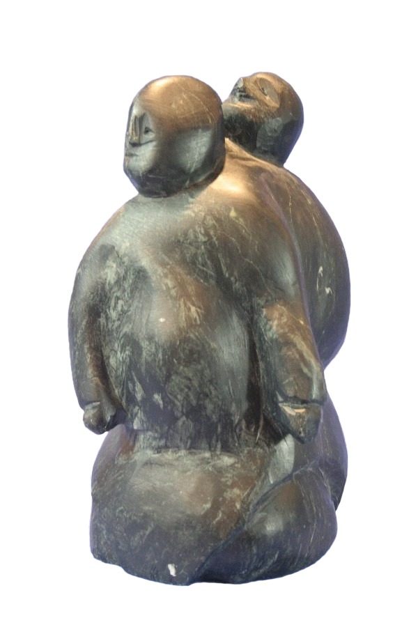 One original inuit art sculpture hand carved by Tuna Iquliq in basalt ''Mother and Child'' from Baker Lake, Nunavut.