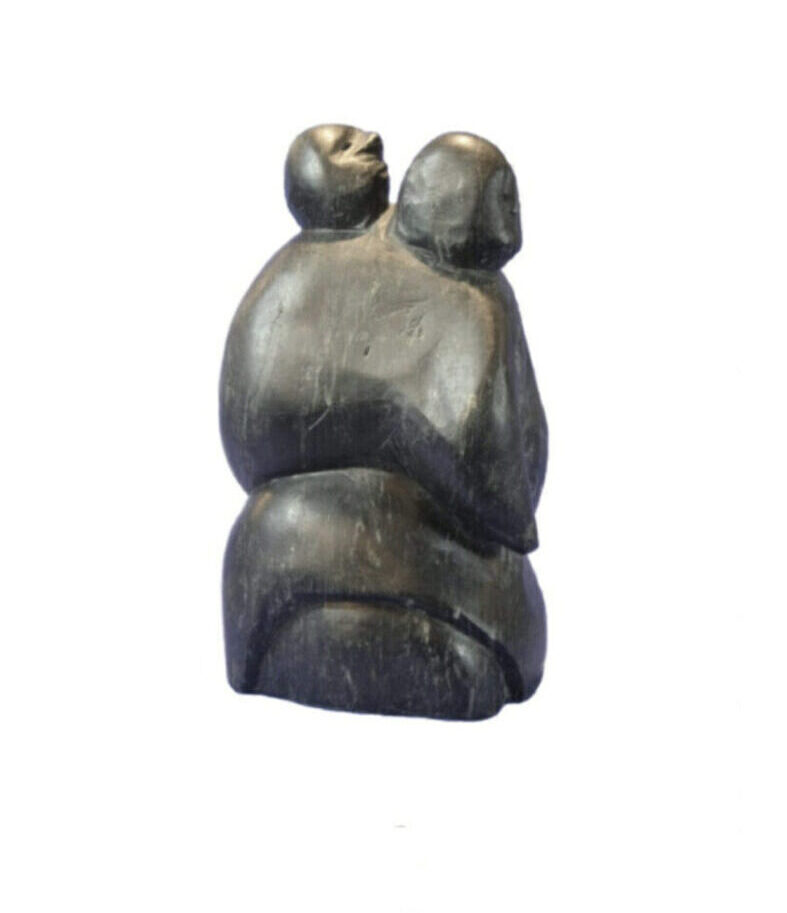 One original inuit art sculpture hand carved by Tuna Iquliq in basalt ''Mother and Child'' from Baker Lake, Nunavut.