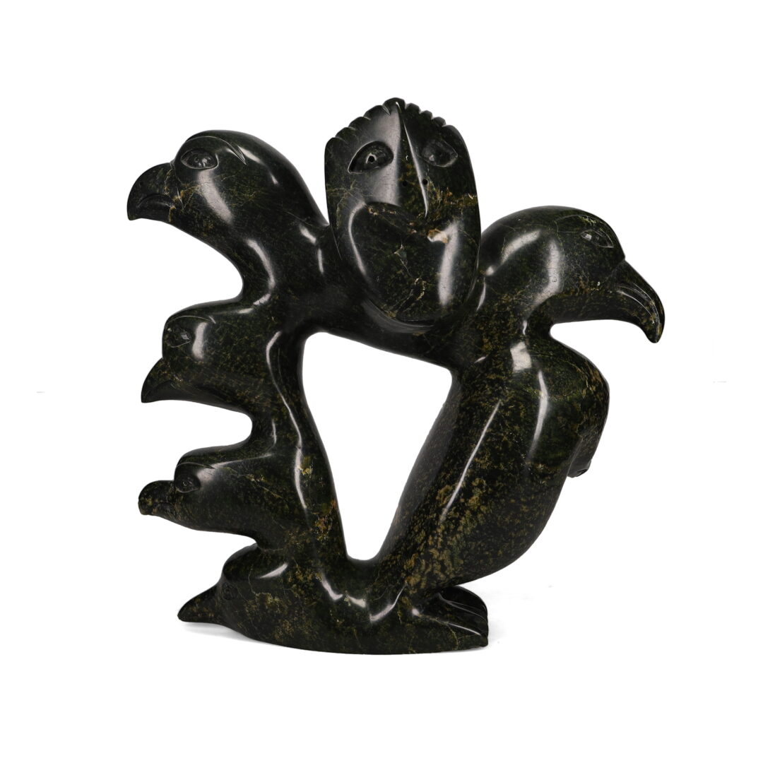 One original hand-carved sculpture by Inuit artist, Pits Qimirpik. One eagle and fish carved out of serpentine.
