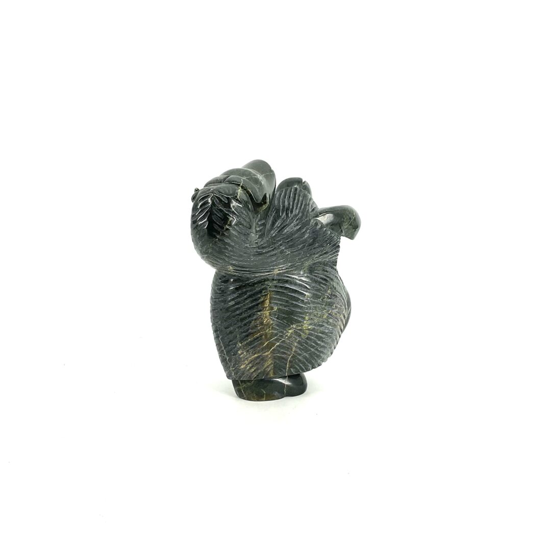 One original Inuit art Muskox sculpture hand carved out of serpentine stone from Nunavut by Pitsulak Qimirpik.