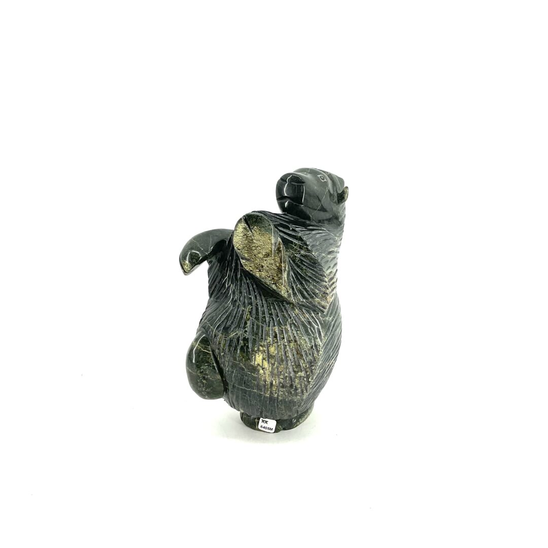 One original Inuit art Muskox sculpture hand carved out of serpentine stone from Nunavut by Pitsulak Qimirpik.