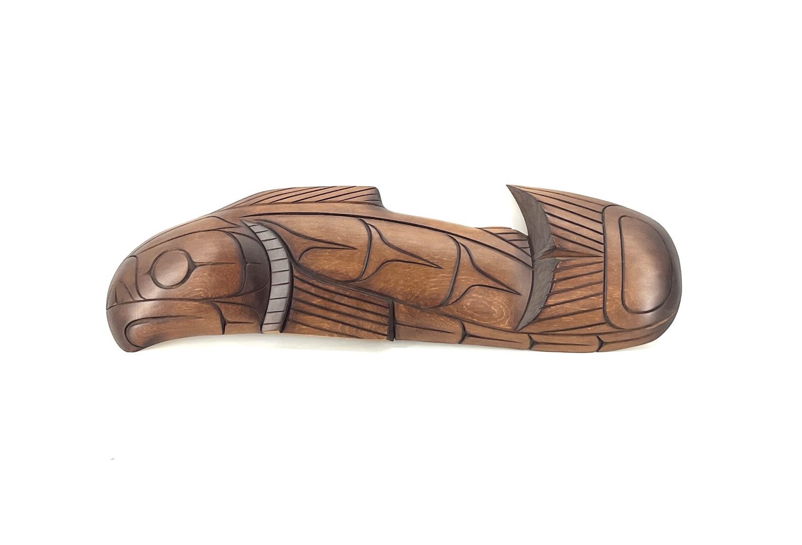 One original Indigenous, First Nations art sculpture hand made from red cedar wood by Doran Lewis ''Salmon plaque''.