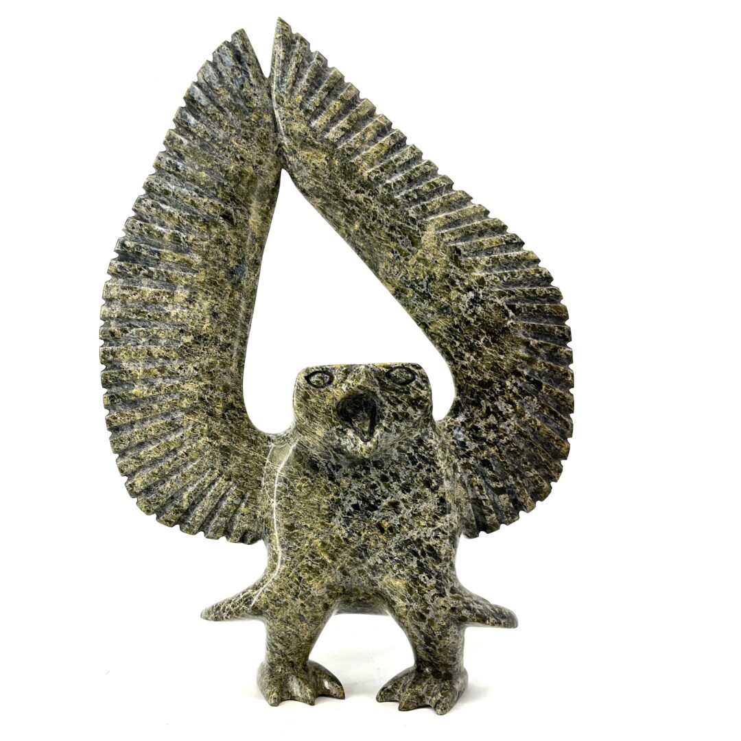 One original hand-carved sculpture by Pootoogook Qiatsuk from Iqaluit, Nunavut. One owl sculpture made out of serpentine.