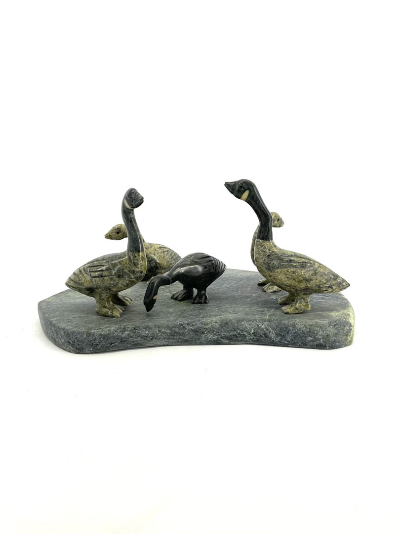 One original hand-carved sculpture by Johnnysa Mathewsie from Cape Dorset, Nunavut. Geese sculpture carved out of serpentine.
