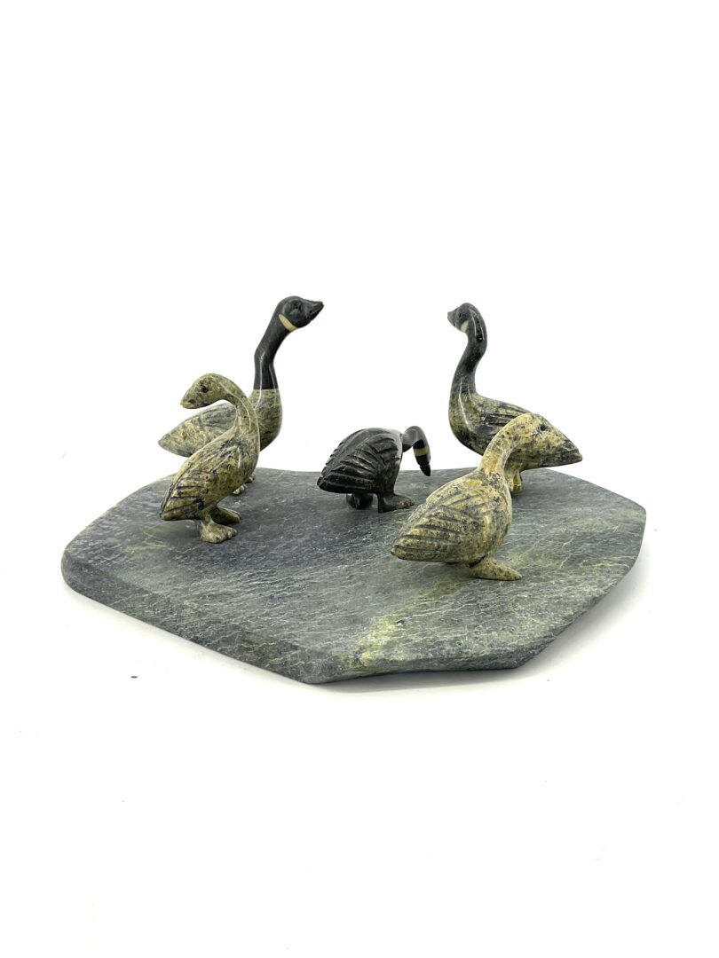 One original hand-carved sculpture by Johnnysa Mathewsie from Cape Dorset, Nunavut. Geese sculpture carved out of serpentine.