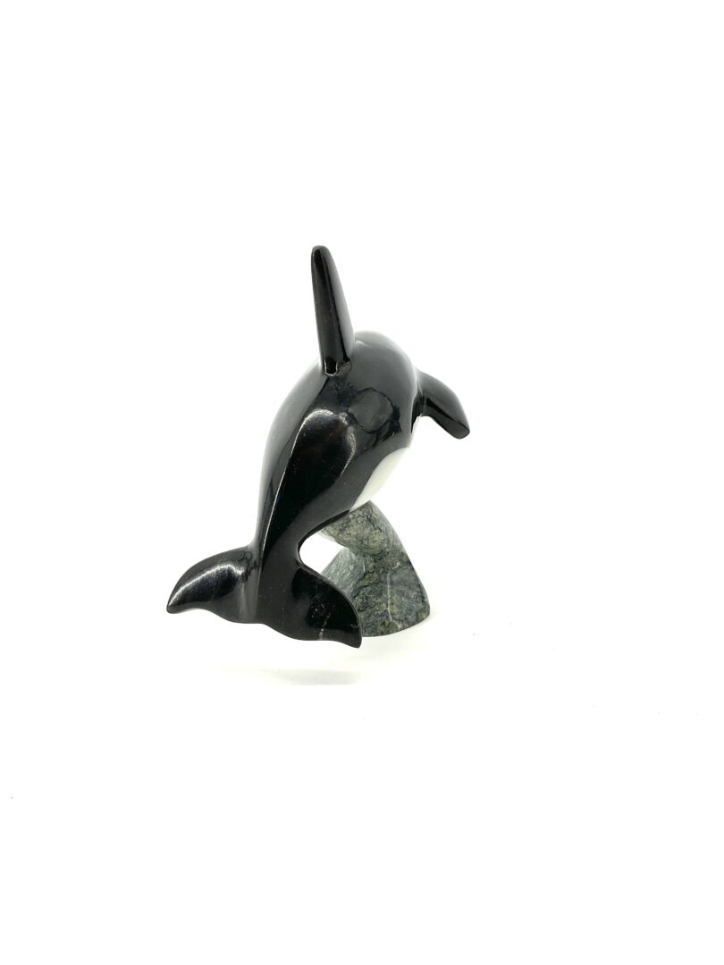 One original hand-carved sculpture by Johnnysa Mathewsie from Cape Dorset. Orca whale sculpture carved out of serpentine with white marble inlay.