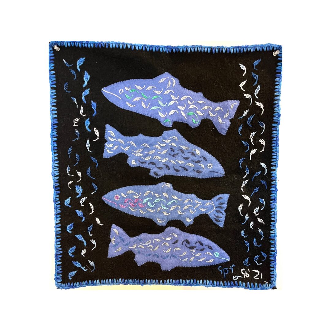 One original hand sewn wall hanging by Eva Noah from Baker Lake, Nunavut. Fishes wall hanging made out of felt.