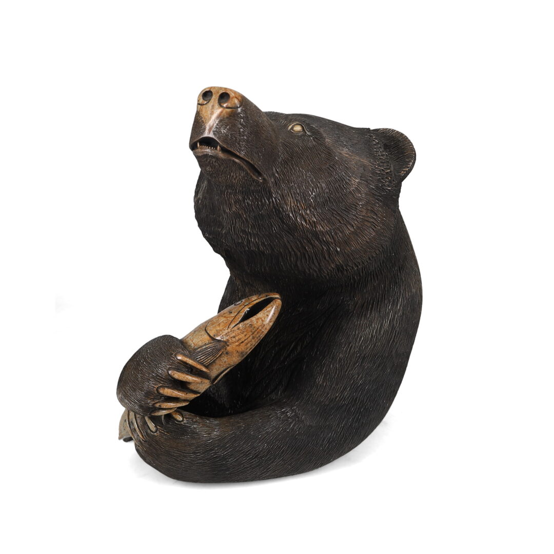 One original hand-carved sculpture by Iroquois artist, Eric Silver. One bear and fish carved out of soapstone.