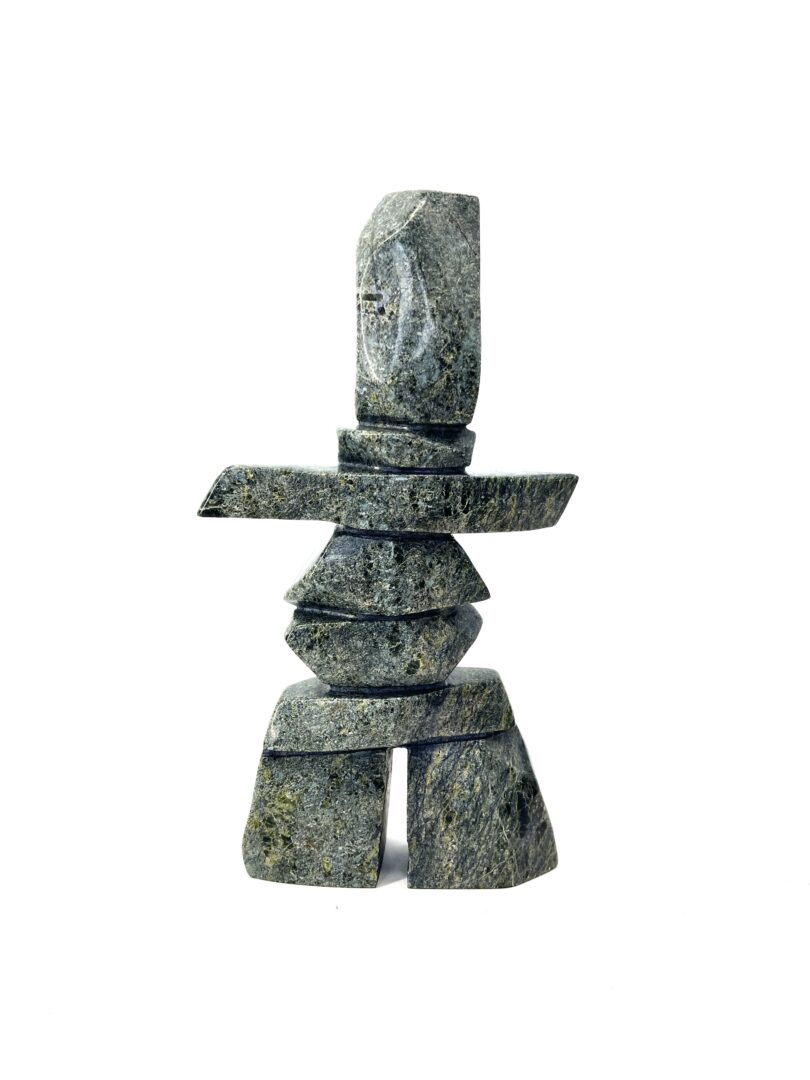 One original sculpture hand-carved by Mathewsie Oshutsiaq from Cape Dorset. One inukshuk made out of serpentine.