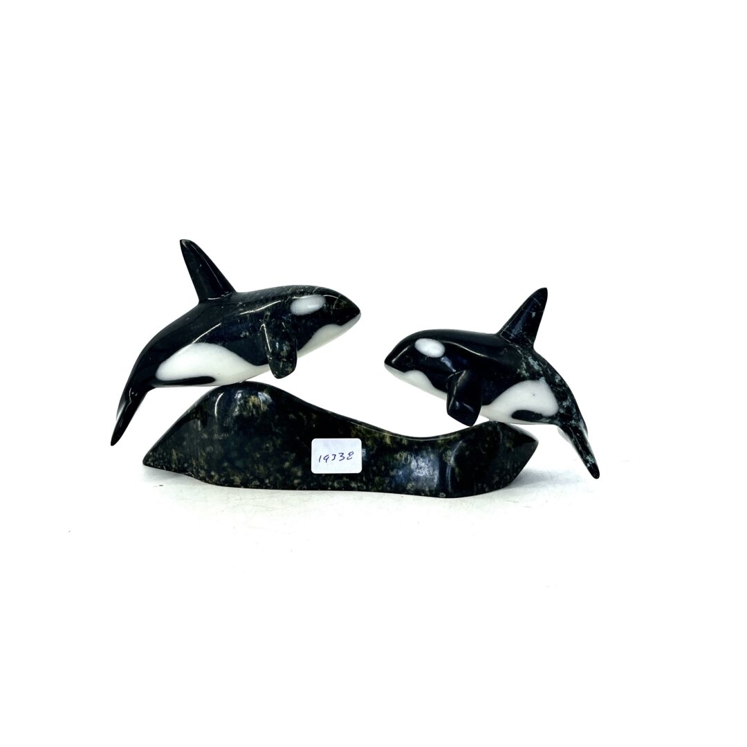 One original hand-carved sculpture by Inuit artist Johnnysa Mathewsie. Two killer whales made out of serpentine and white marble.