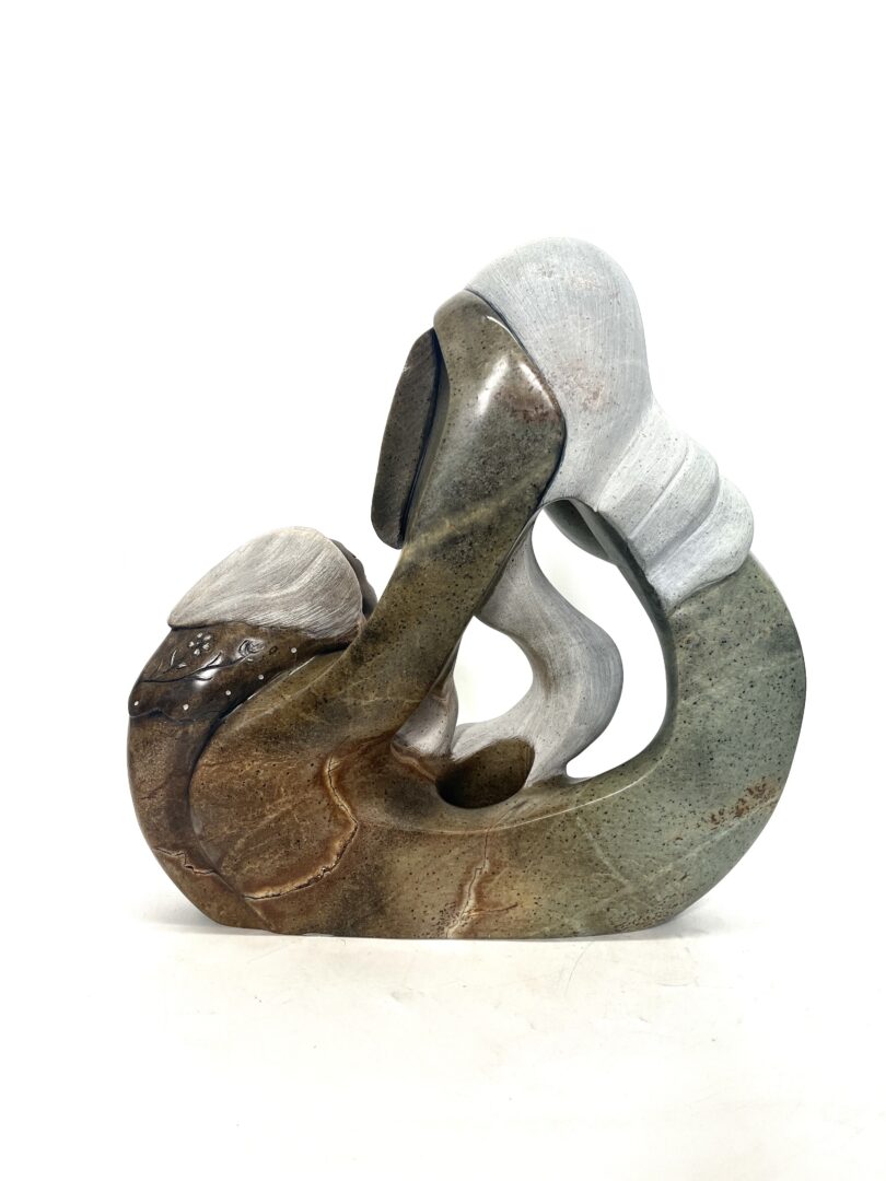 One original hand-carved sculpture by Six Nations artist, Dale Isaacs. One sacred bond sculpture made out of soapstone.