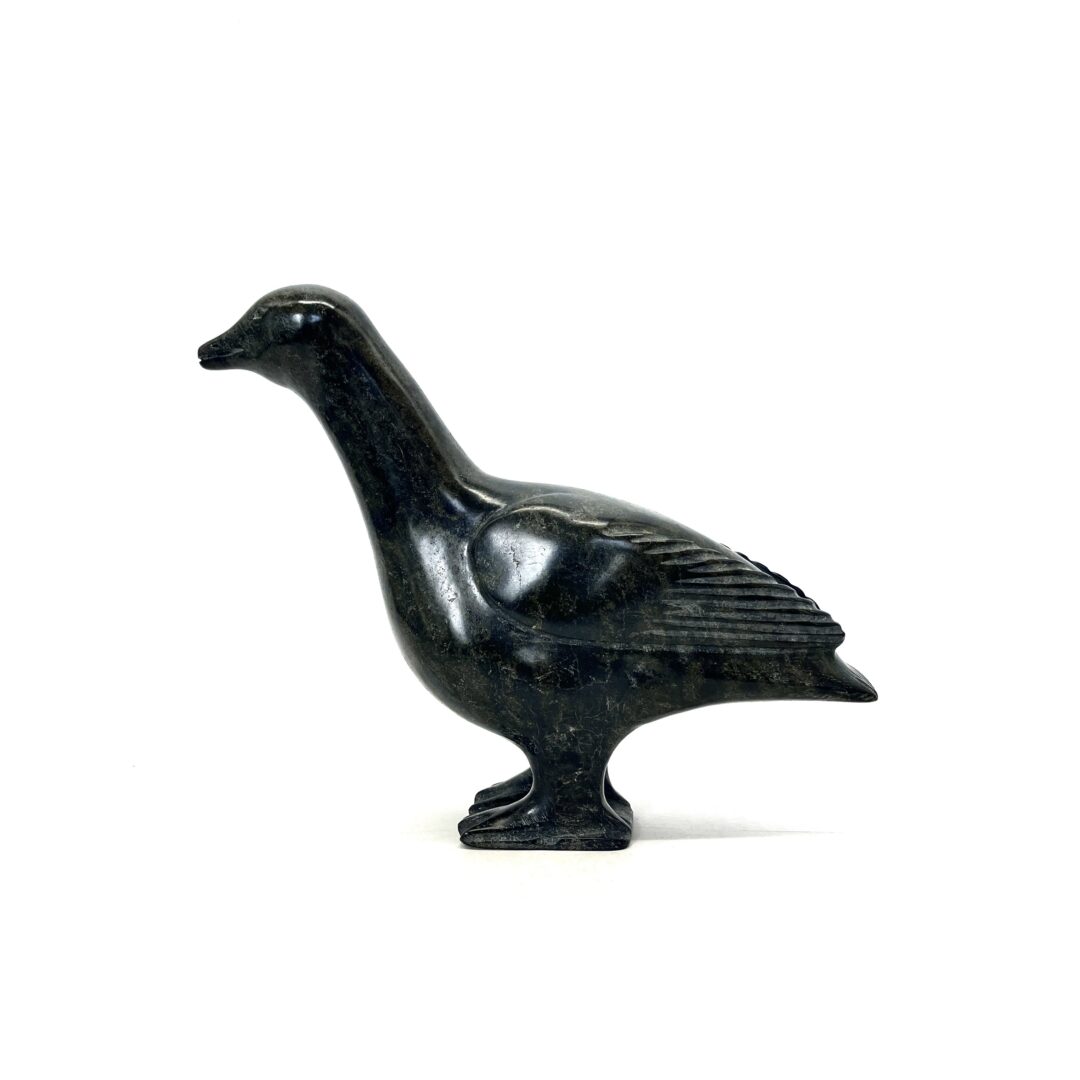 One original hand-carved sculpture by an unknown Inuit artist. One snow goose sculpture made out of serpentine.