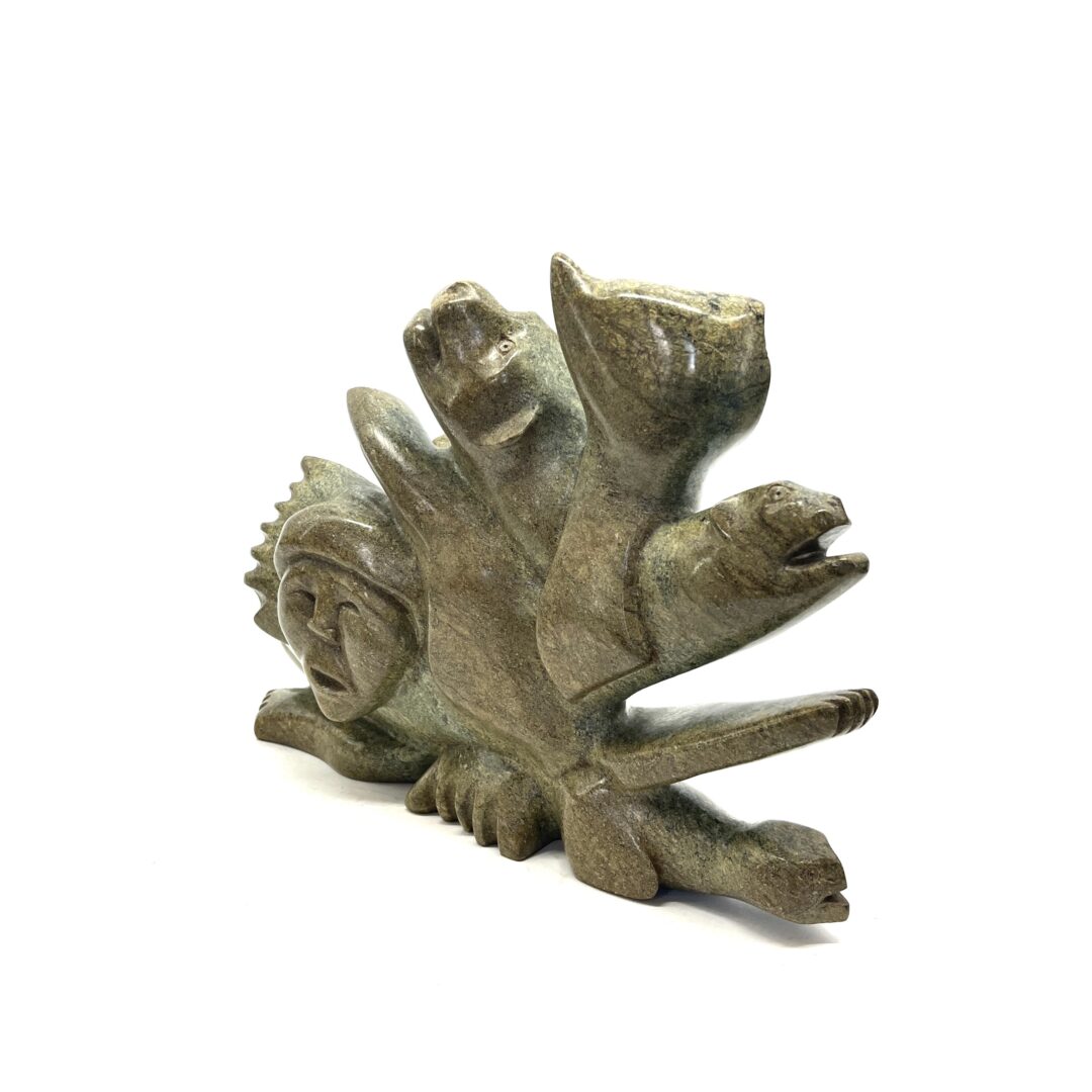 One original hand-carved sculpture by Inuit artist, Manomie Tukiki. One spirits sculpture made out of soapstone.