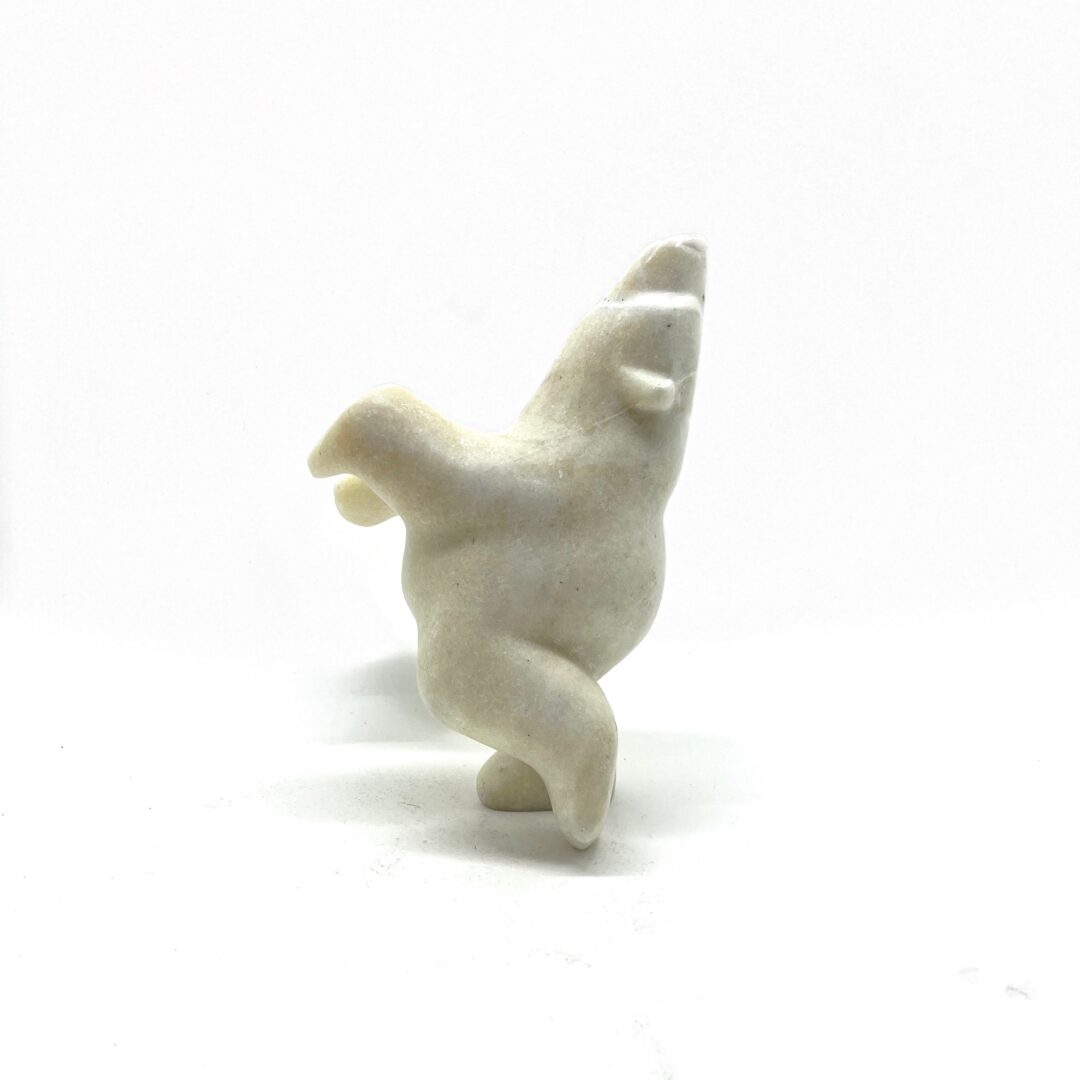 One original hand-carved sculpture by Inuit artist, Alla Shutiapik. One dancing bear carved out of white marble.