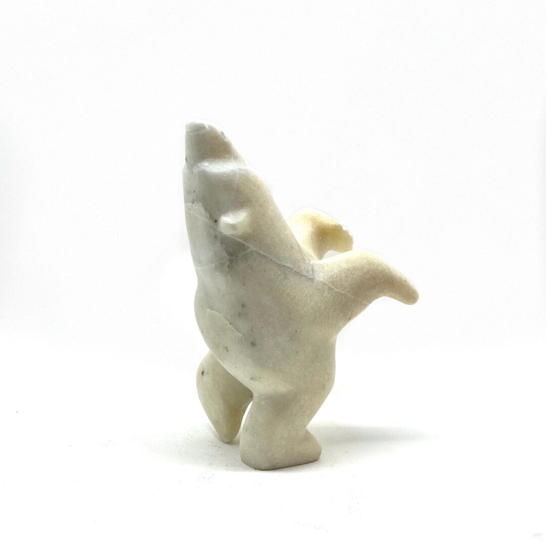 One original hand-carved sculpture by Inuit artist, Alla Shutiapik. One dancing bear carved out of white marble.