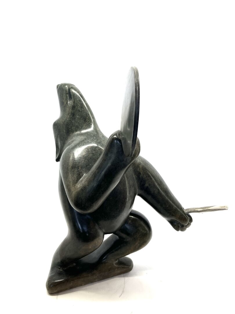 One original hand-carved sculpture by Inuit artist, Abraham Anghik Ruben. One bear drum dancer carved out of soapstone.