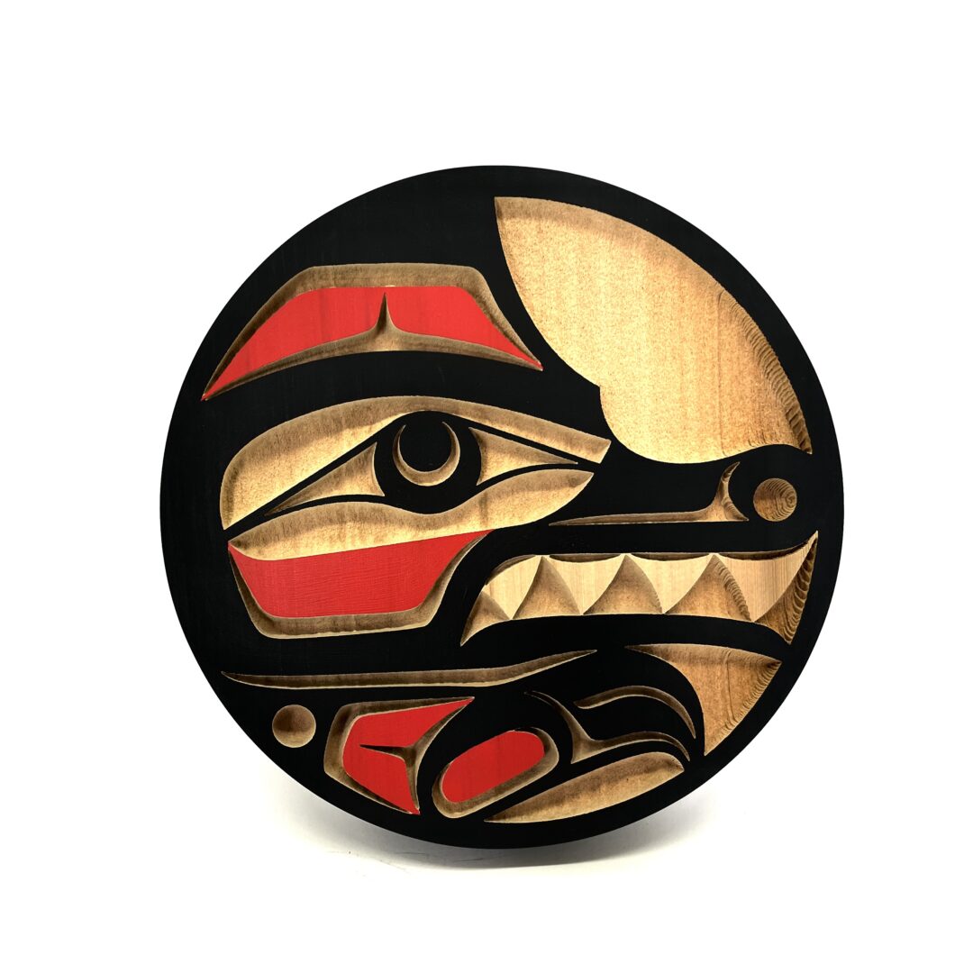 One original hand-carved panel by Nuxalk artist, Nusmata. One wolf panel carved out of cedar wood and acrylic paint.