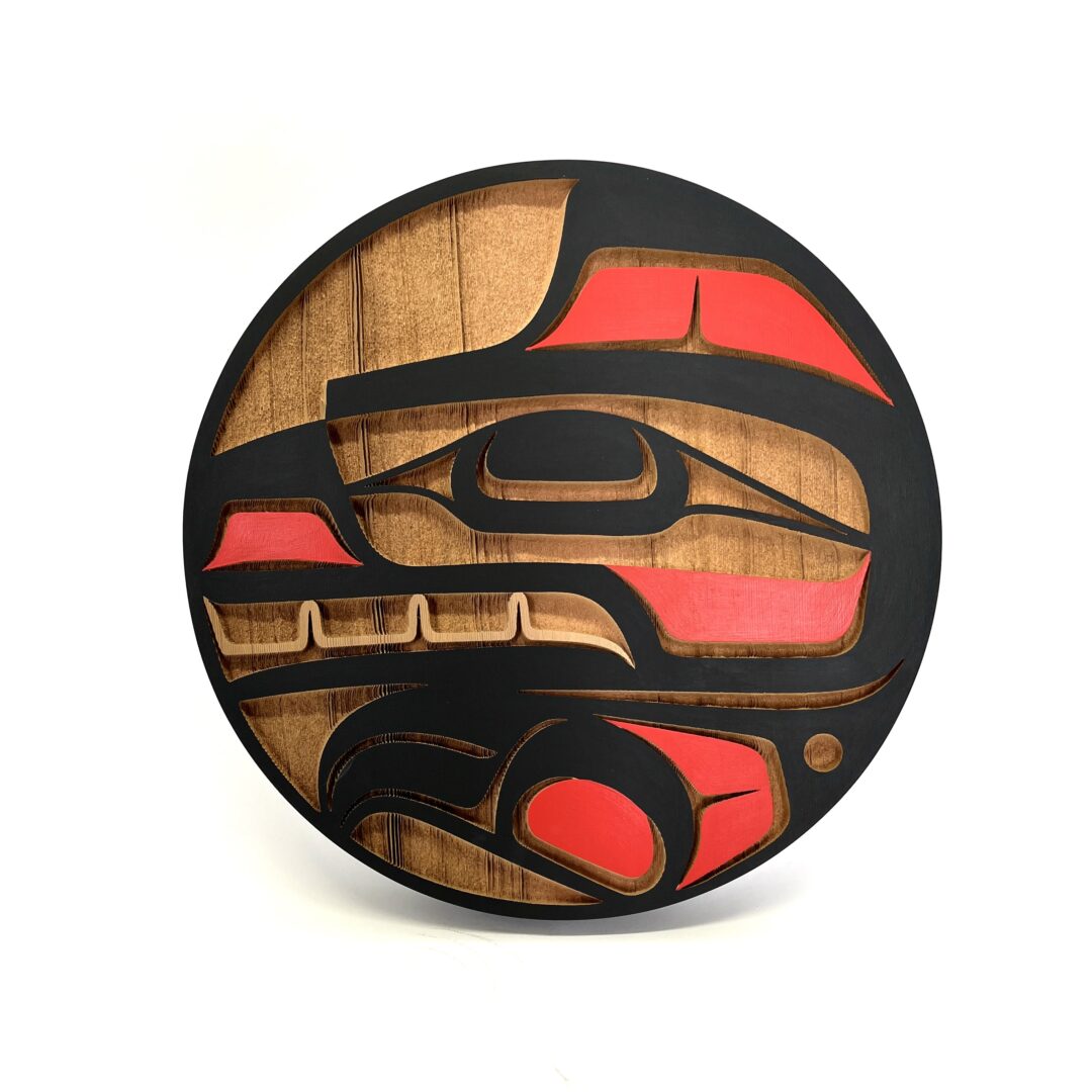One original hand-carved panel by Nuxalk artist, Nusmata. One bear panel carved out of cedar wood and acrylic paint.