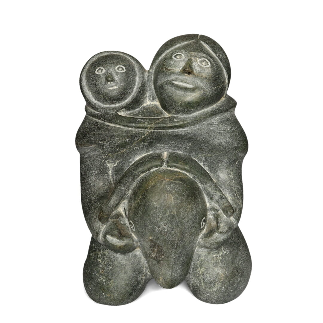One original hand-carved sculpture by Inuit artist Mathew Aqigaaq. One Mother and Child carved out of basalt stone.