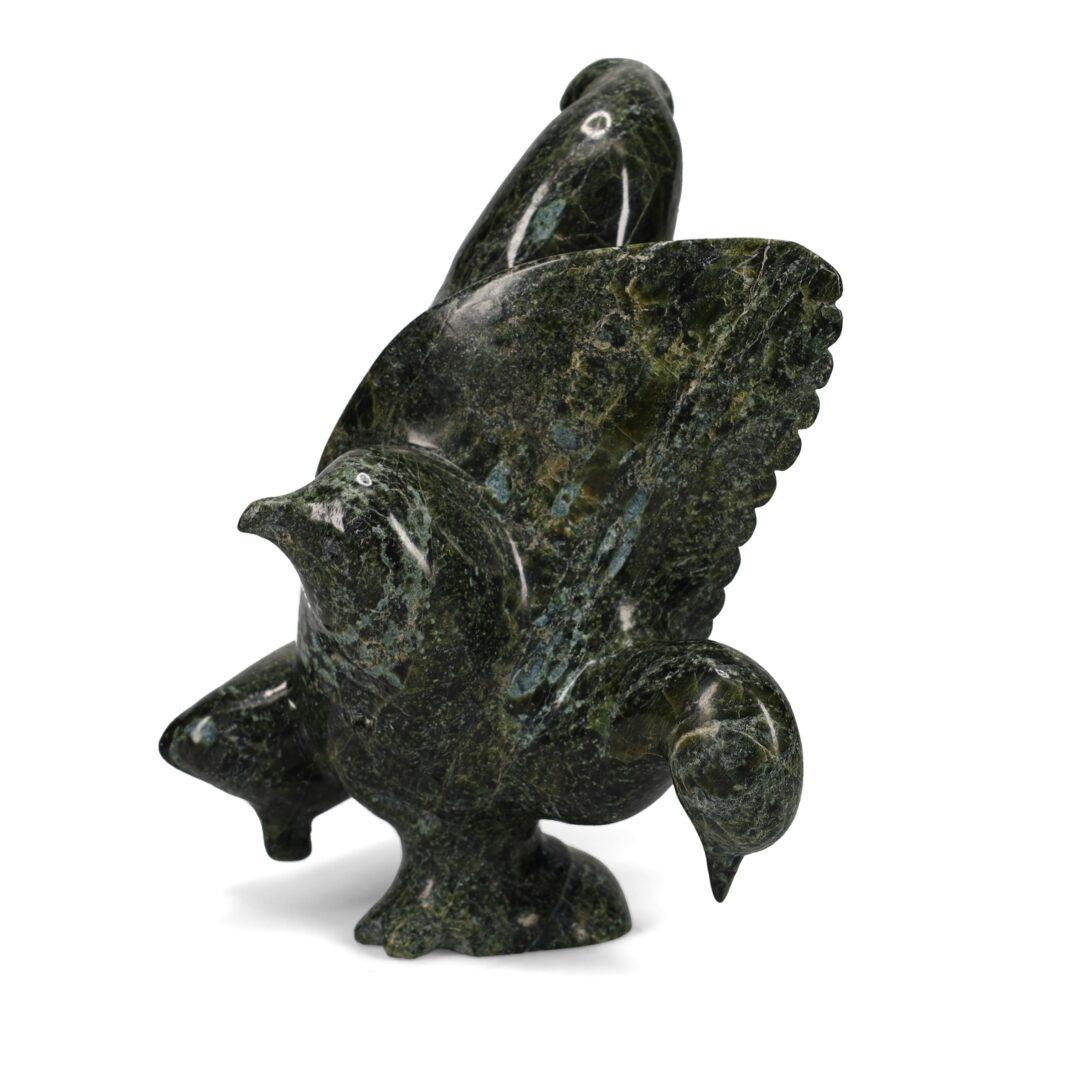 One original hand-carved sculpture by Inuit artist Pudlalik Shaa. One transformation piece carved out of serpentine.