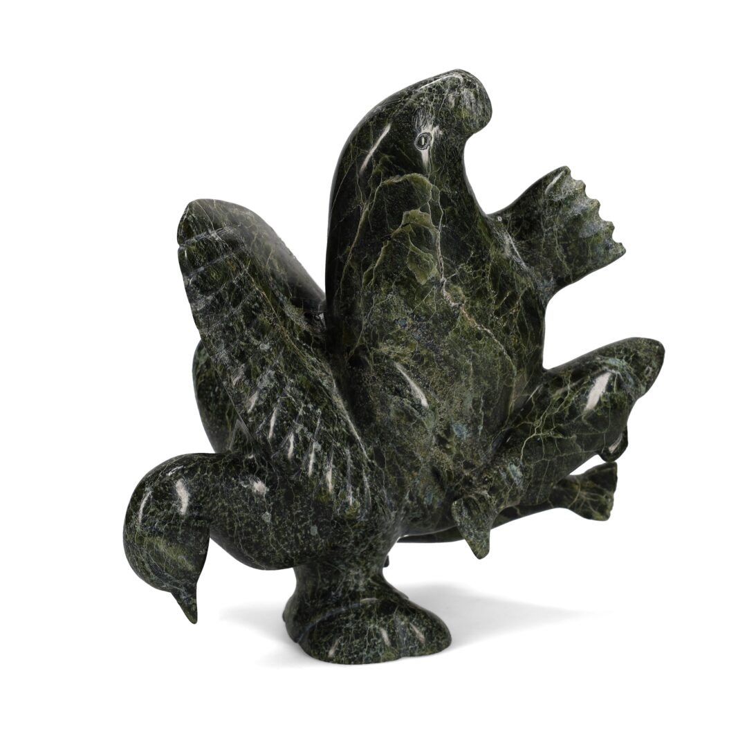 One original hand-carved sculpture by Inuit artist Pudlalik Shaa. One transformation piece carved out of serpentine.