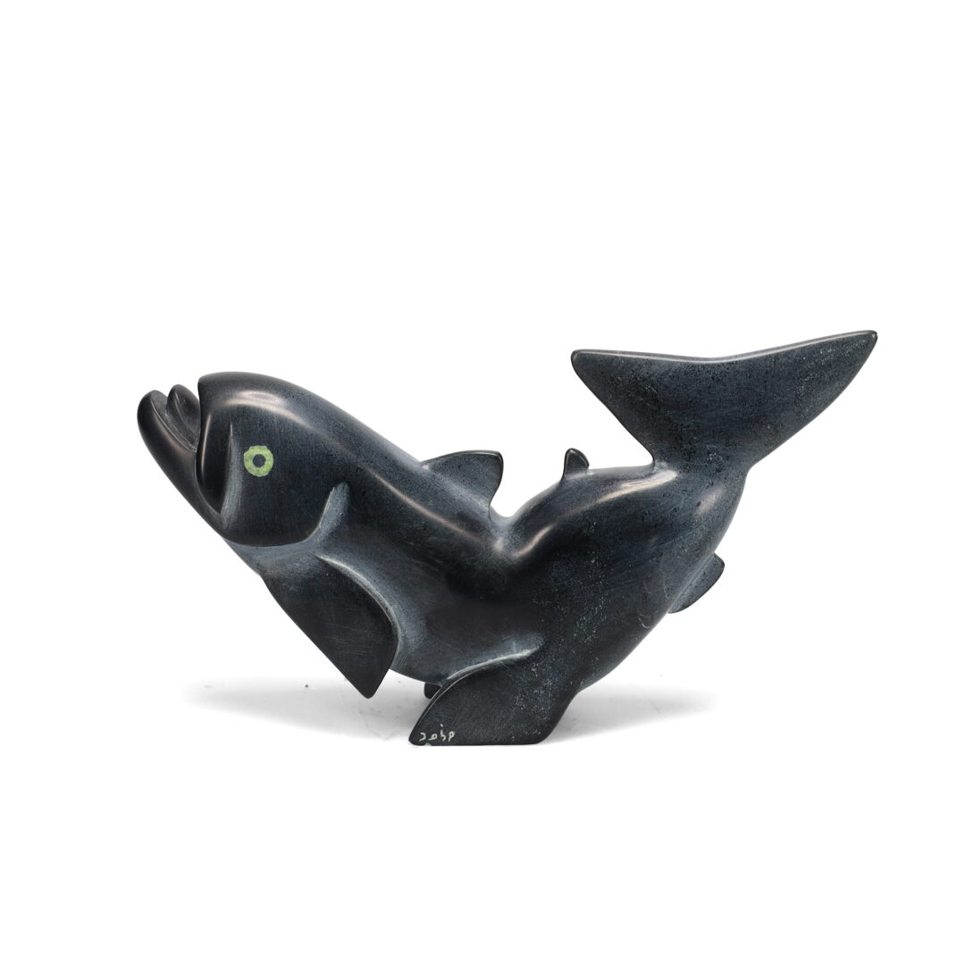 One original hand-carved sculpture by Inuit artist Toonoo Sharky. One two way fish carved out of serpentine.