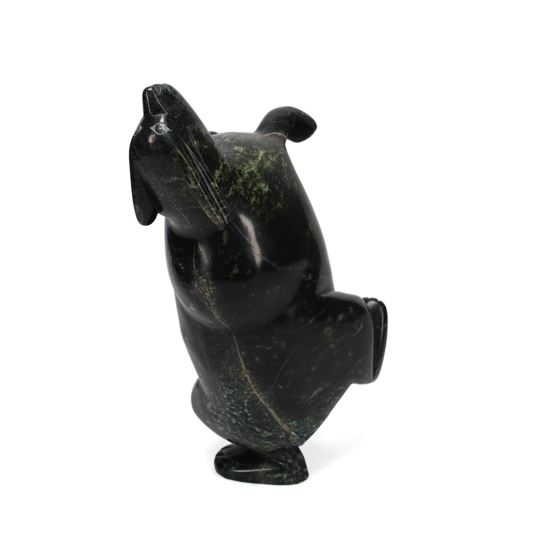One original hand-carved sculpture by Inuit artist Pitseolak Qimirpik. One dancing rabbit carved out of serpentine.