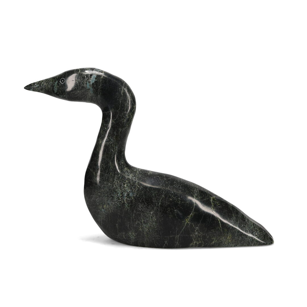 One original hand-carved sculpture by Inuit artist, Nuna Parr, from Cape Dorset. One loon carved out of serpentine stone.