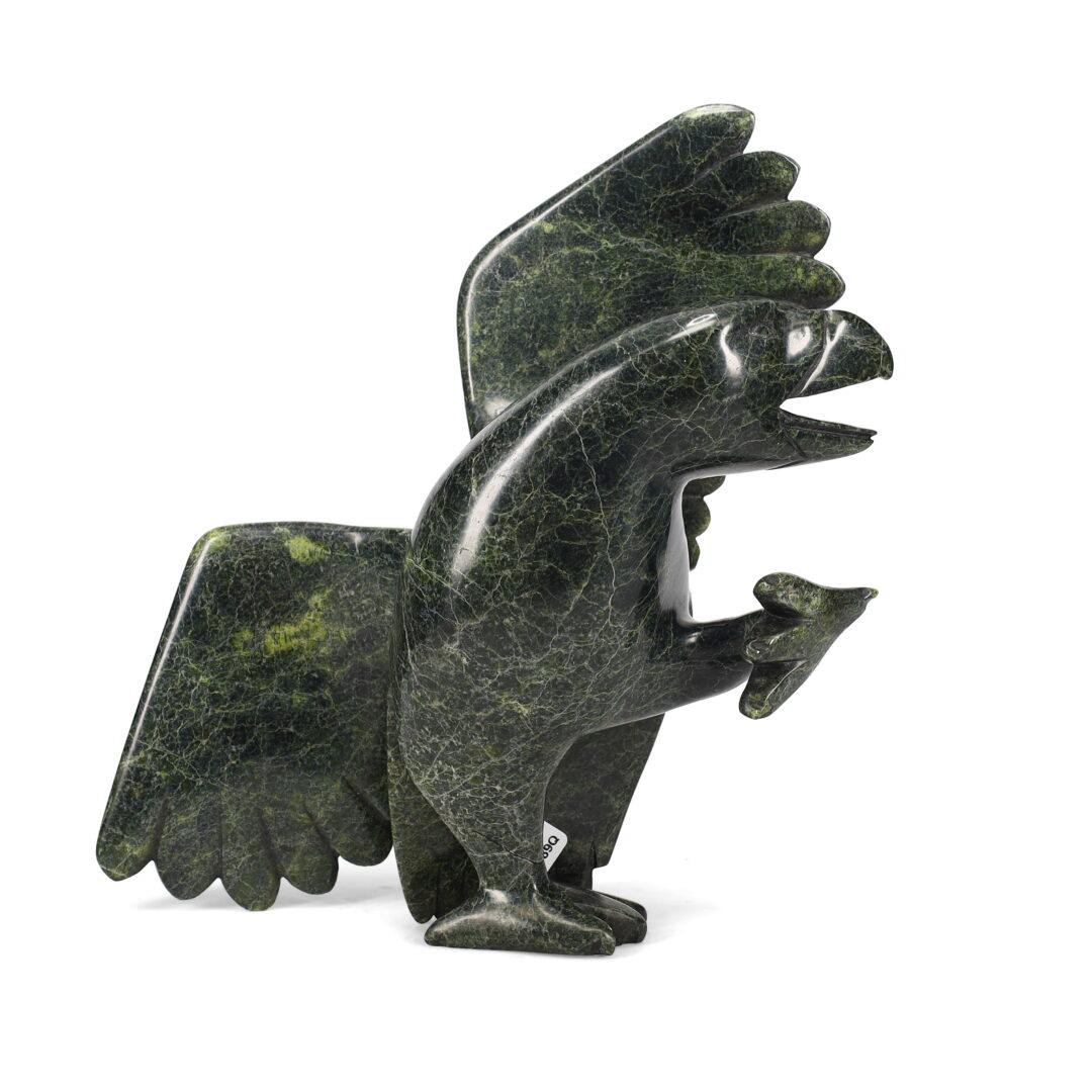 One original hand-carved sculpture by Inuit artist Killiktee Killiktee. One raven carved out of serpentine.