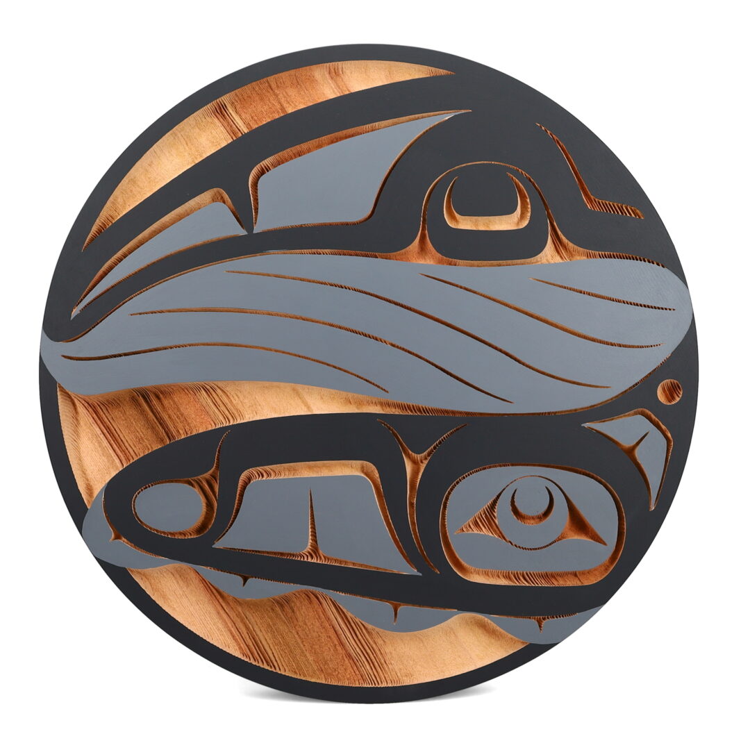 One original panel by Nuxalk artist, Nusmata. One humpback whale panel (black and grey) carved out of cedar wood.