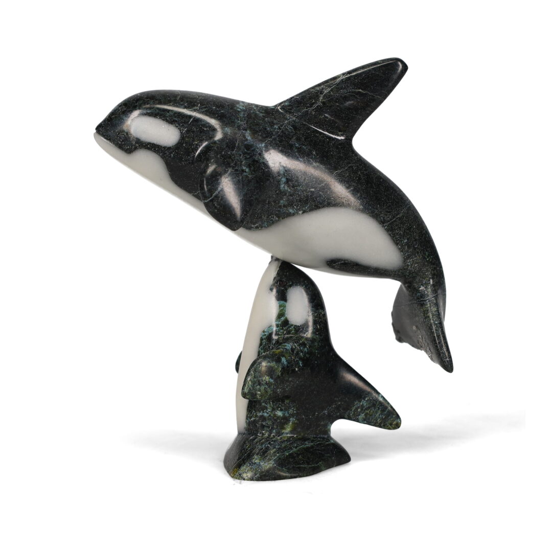 One original hand-carved sculpture by Inuit artist, Johnnysa Mathewsie. Two killer whales carved out of serpentine and marble
