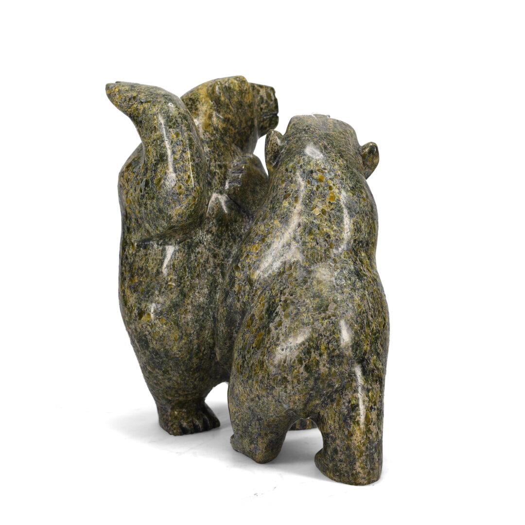 One original sculpture by Inuit artist, Pitseolak Oshutsiak. Two bears in action carved out of serpentine stone.