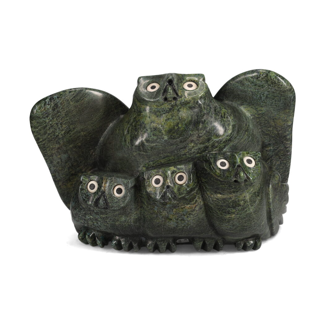 One original hand-carved sculpture by Inuit artist, Joanassie Manning. One owl with three chicks carved out of serpentine.