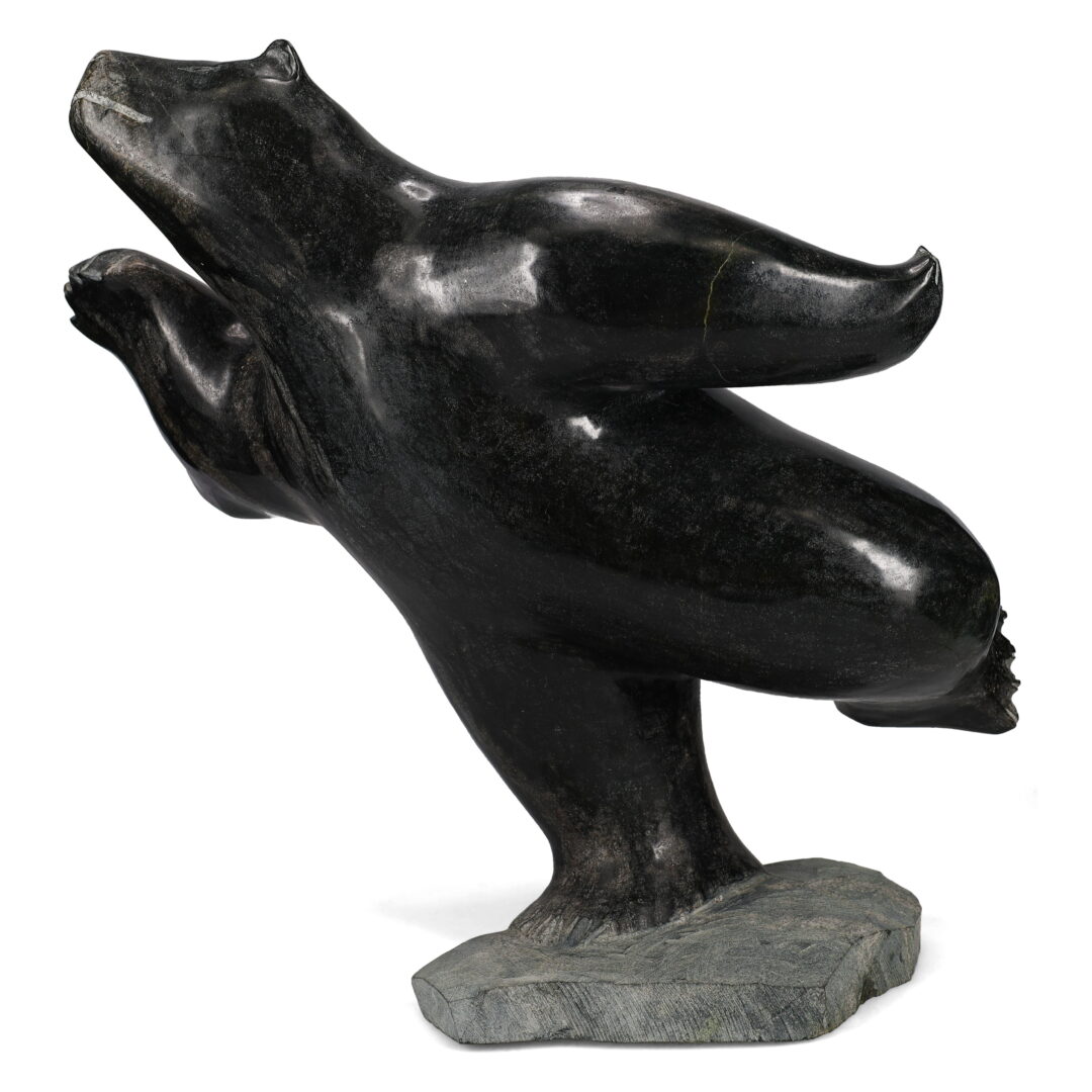One original hand-carved sculpture by Inuit artist, Jaco Ishulutaq. One dancing bear carved out of serpentine.