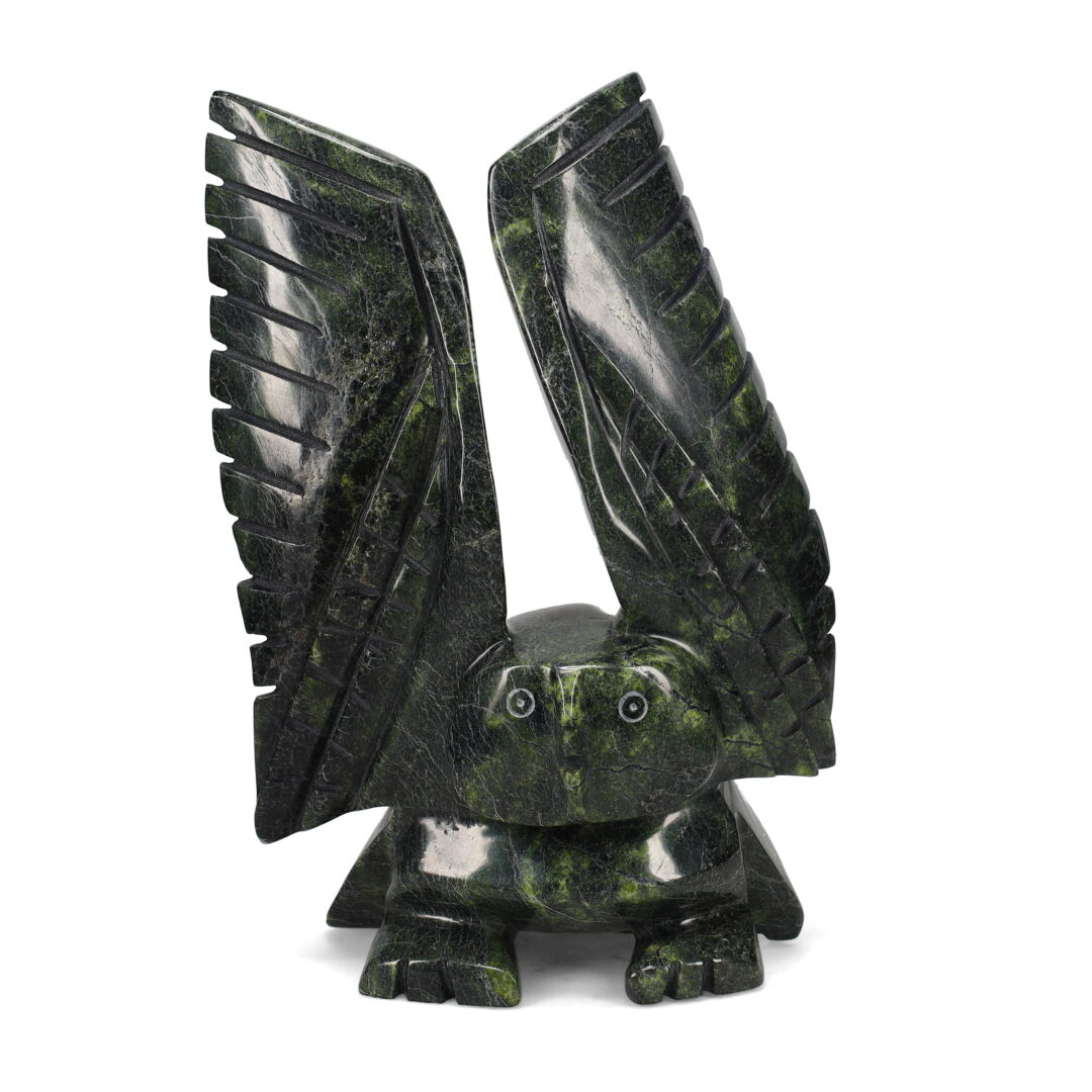 One original hand-carved sculpture by Inuit artist, Matt Oshutsiaq. One owl carved out of serpentine stone.