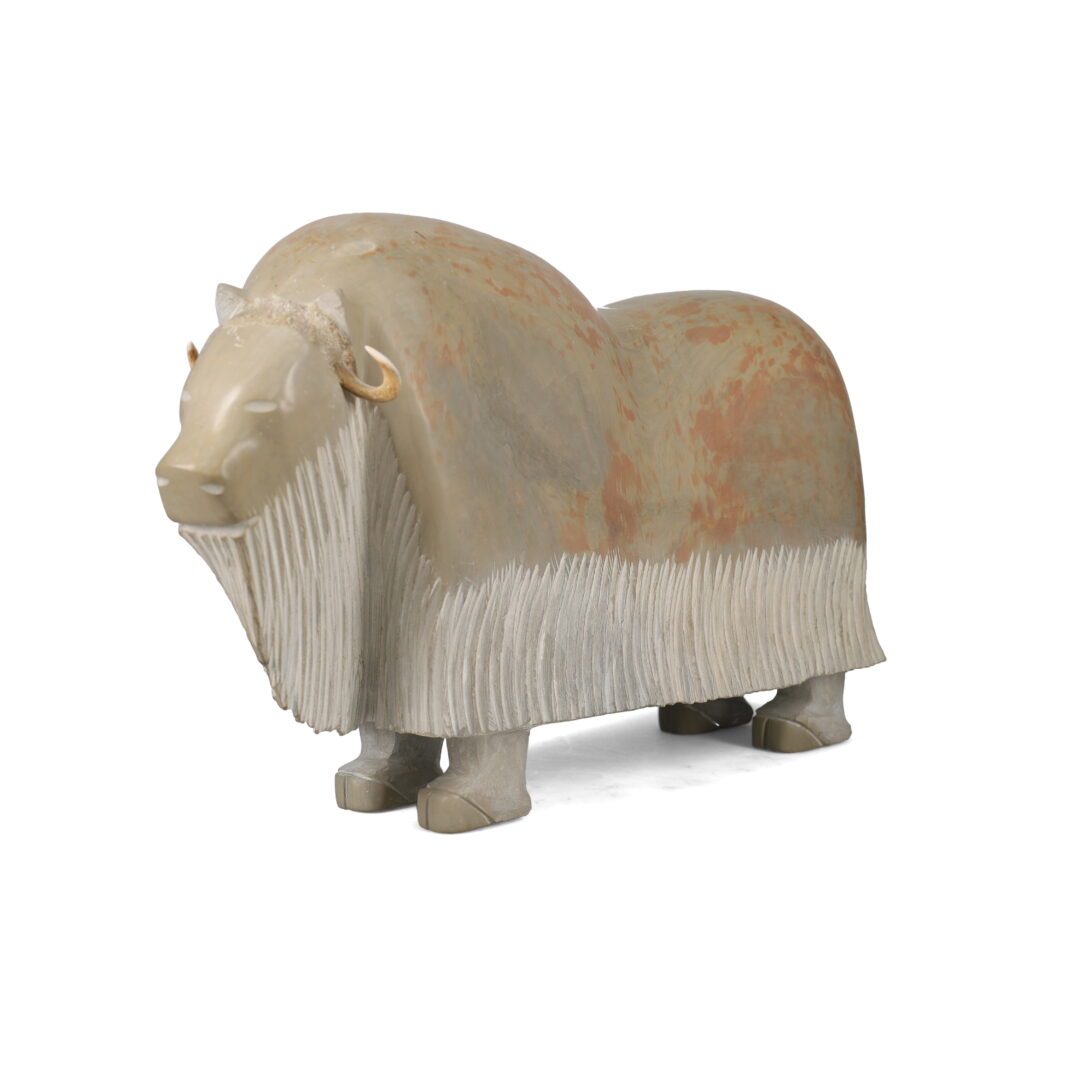 One original hand-carved sculpture by Inuit artist, Simeonie Killiktee. One muskox carved out of soapstone and antler.