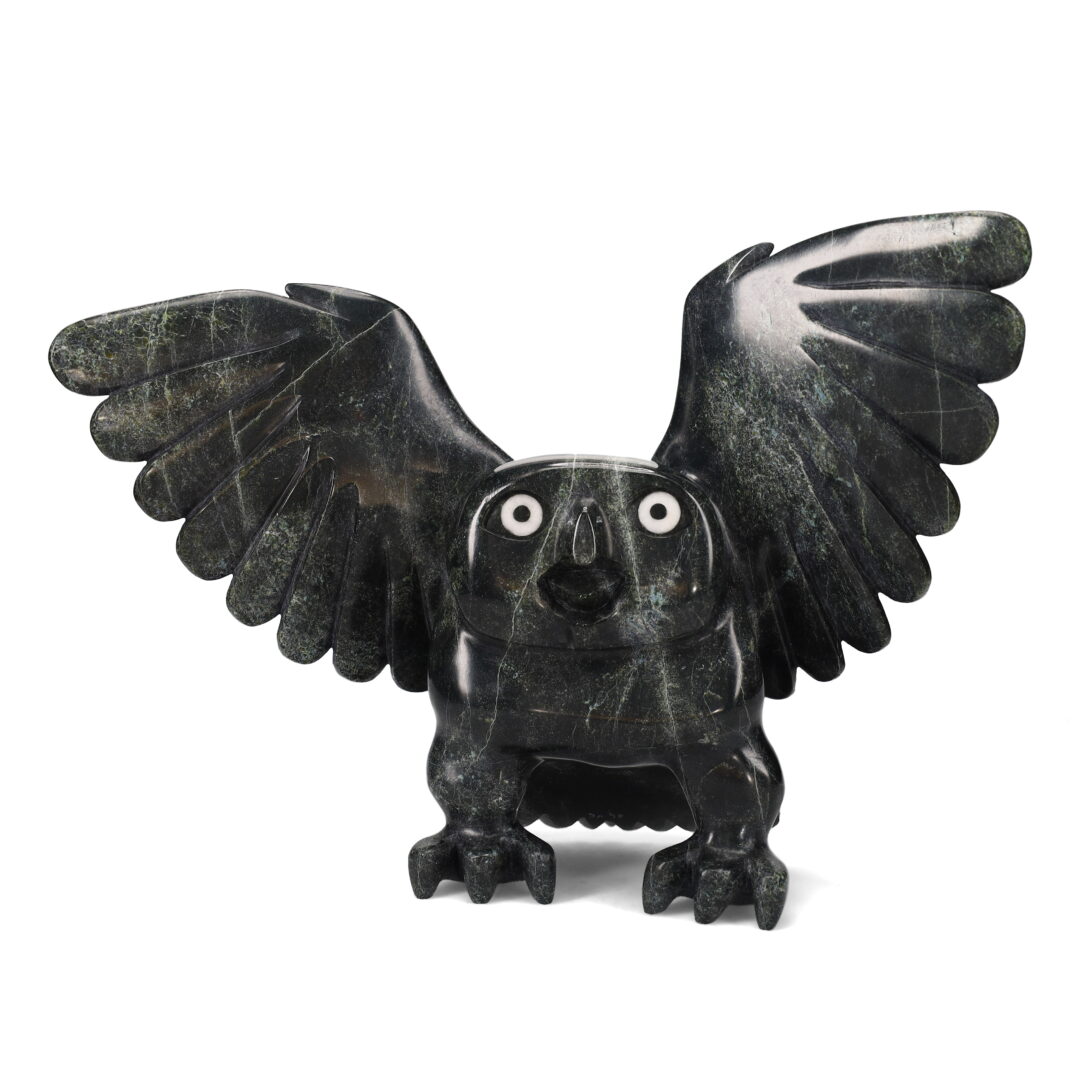 One original hand-carved sculpture by Inuit artist Toonoo Sharky. One owl carved out of serpentine and marble.