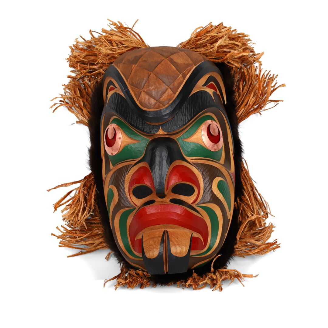 One original hand-carved sculpture by Kwakwak'wakw artist, Junior Henderson. One beaver mask carved out of cedar wood.