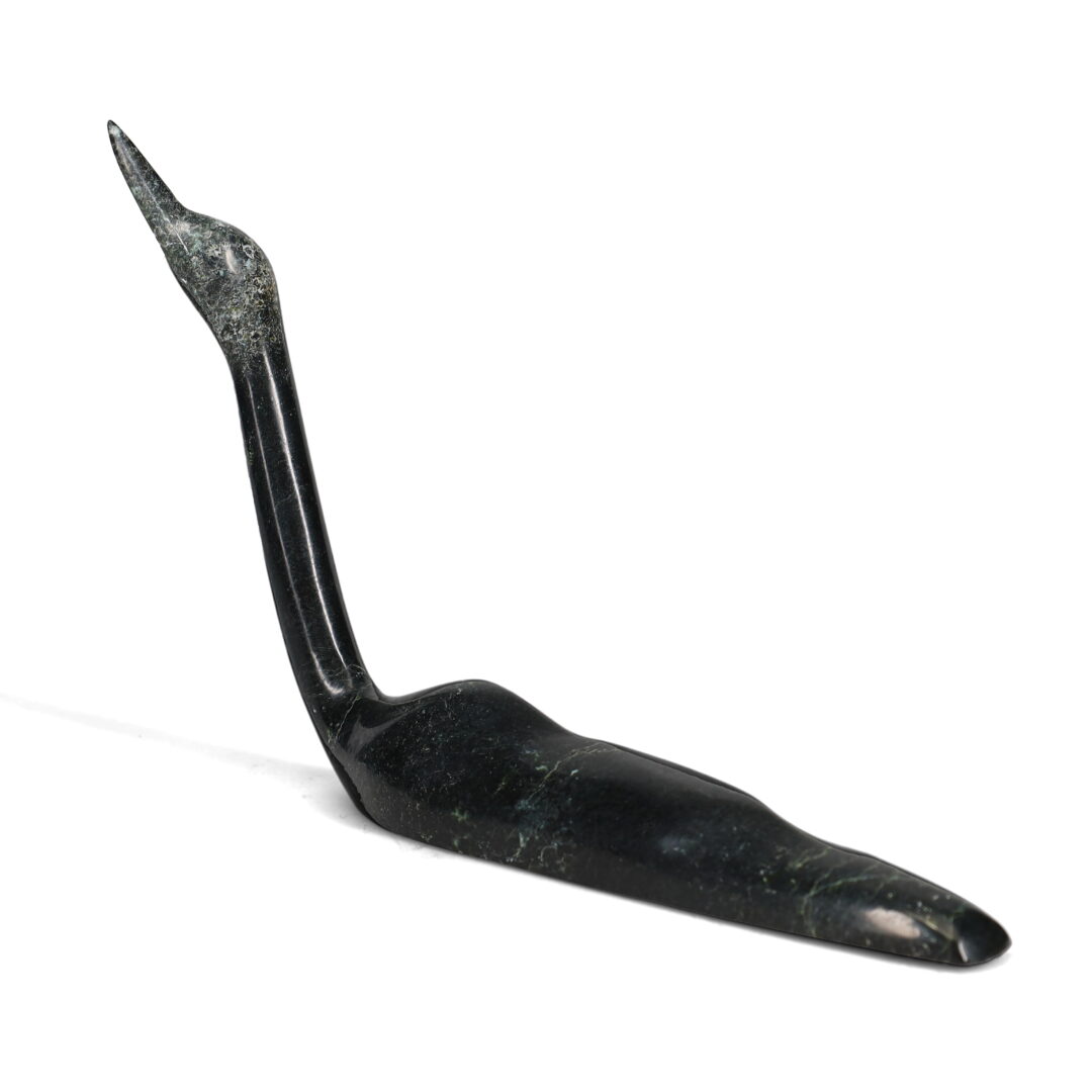 One original hand-carved sculpture by Inuit artist, Ning Ashoona. One loon carved out of serpentine stone.