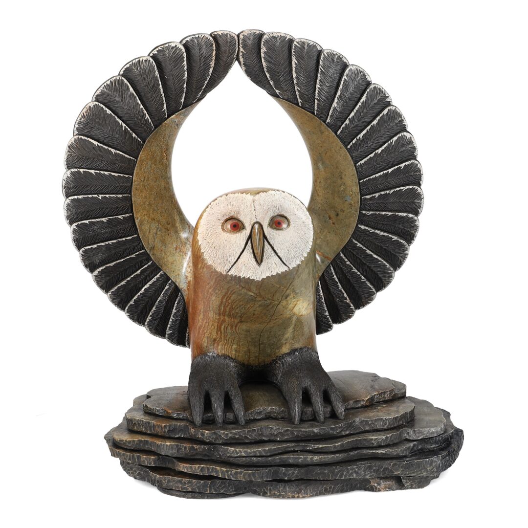 One original hand-carved sculpture by Onondaga artist, Cyril Henry. One majestic owl carved out of soapstone.