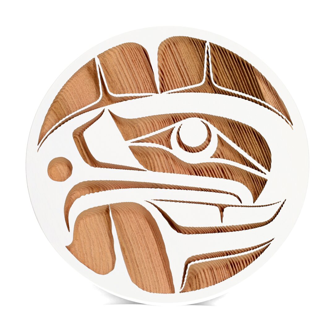 One original panel by Nuxalk artist, Nusmata. One eagle panel carved out of cedar wood and painted in white.