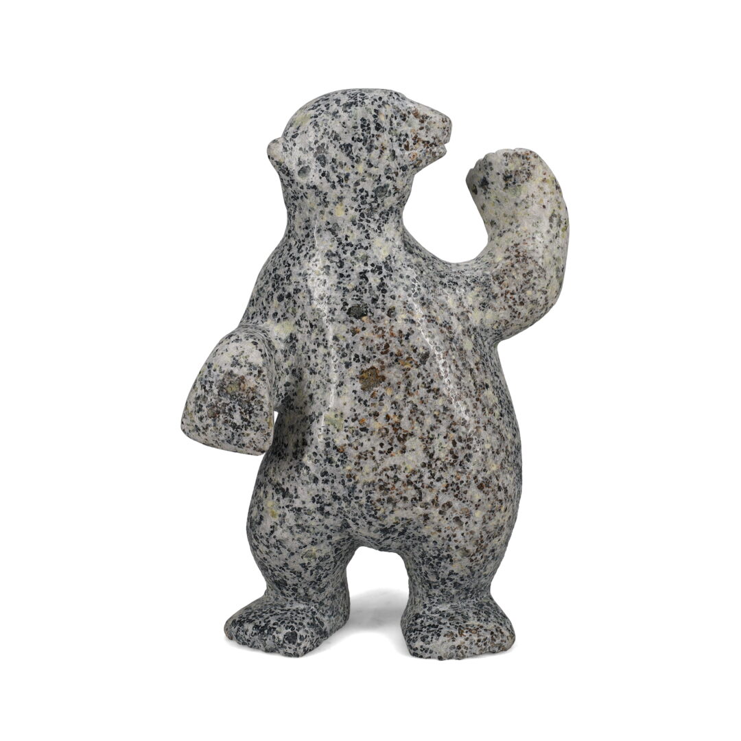 One original hand-carved sculpture by Inuit artist, Simeonie Killiktee. One dancing bear carved out of dolomite.