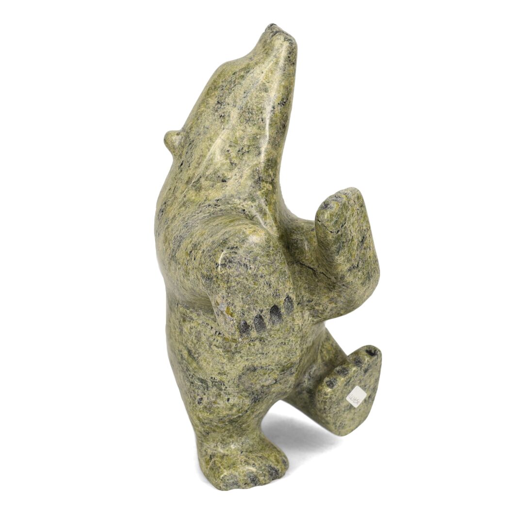 One original hand-carved sculpture by Inuit artist, Joanie Ragee One dancing bear carved out of serpentine.