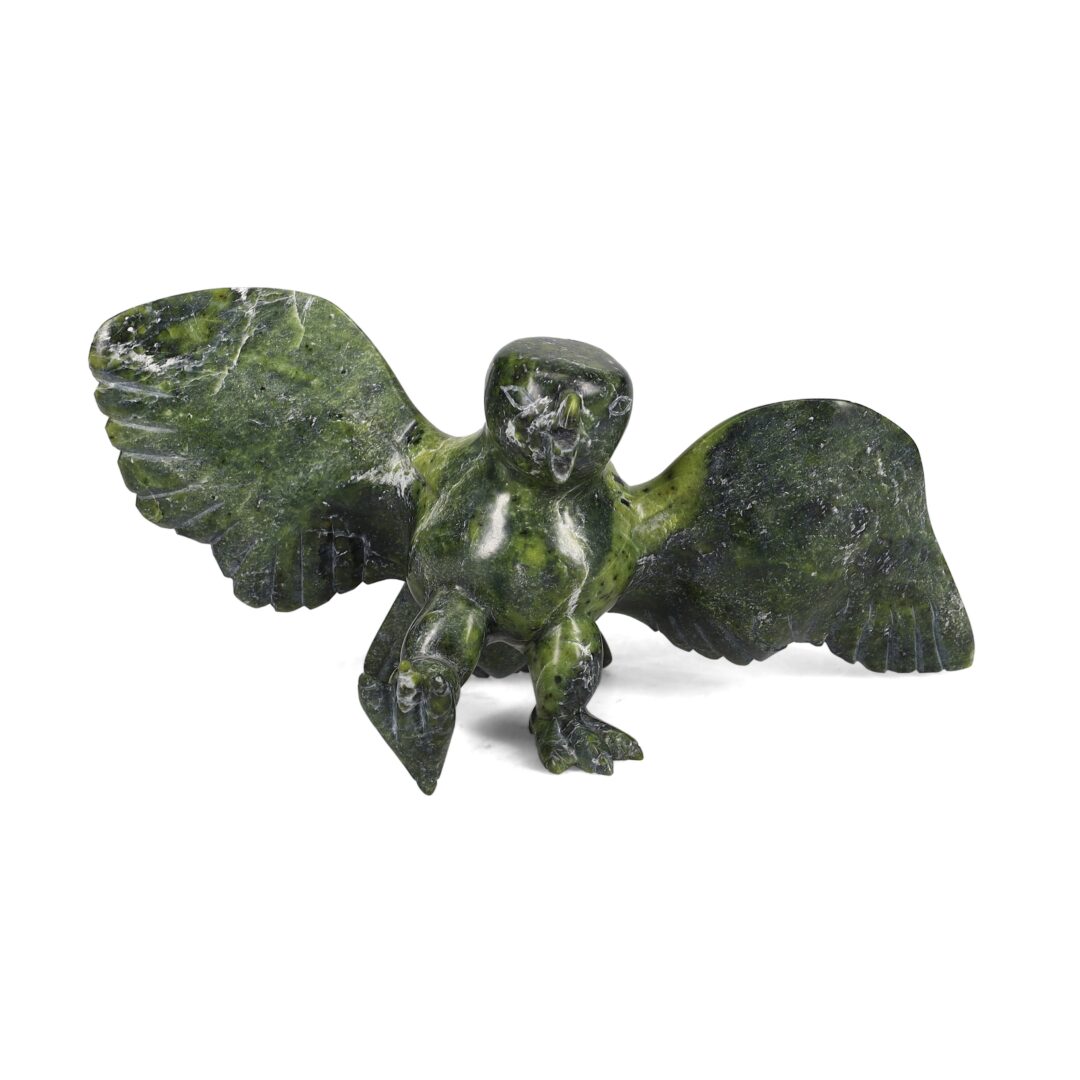 One original hand-carved sculpture by Inuit artist, Moe Kolola. One bird carved out of green serpentine stone.