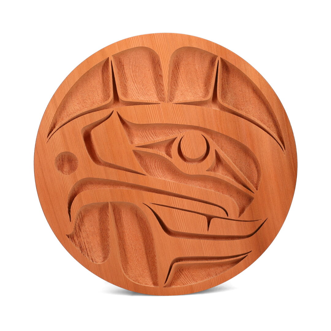 One original cedar wooden panel by Nuxalk artist, Nusmata. One eagle panel carved out of unpainted cedar wood.