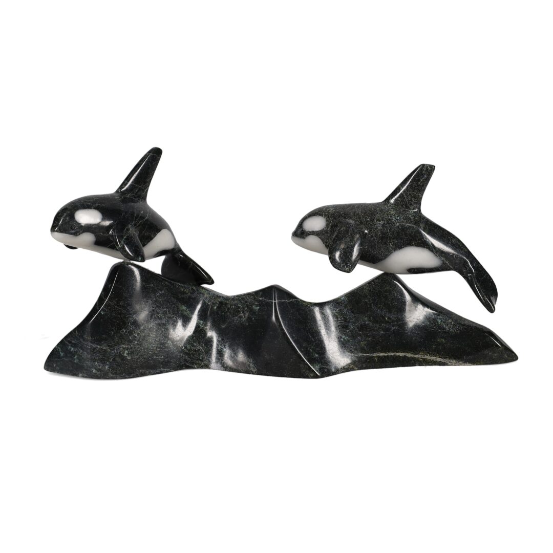 One original hand-carved sculpture by Inuit artist, Johnnysa Mathewsie. One orca mother and child carved out of serpentine.