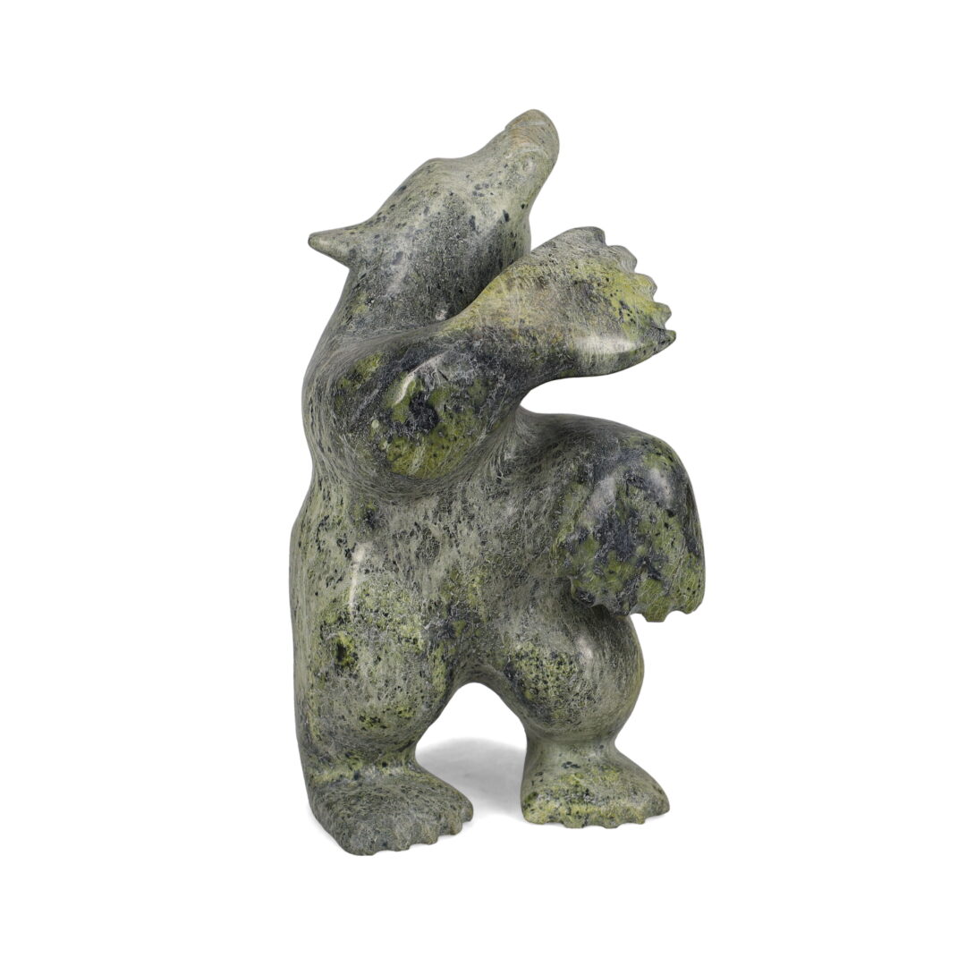 One original hand-carved sculpture by Inuit artist, Ottokie Samayualie. One dancing bear carved out of serpentine.