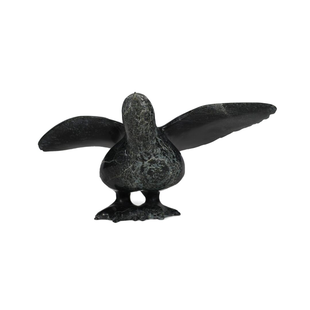 One original hand-carved sculpture by Inuit artist, Pudlalik Shaa. One bird carved out of serpentine stone.
