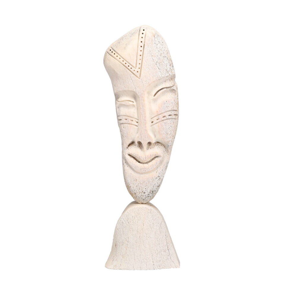 One original hand-carved sculpture by Inuit artist, Billy Merkosak. One face carved out of fossilized whale bone.