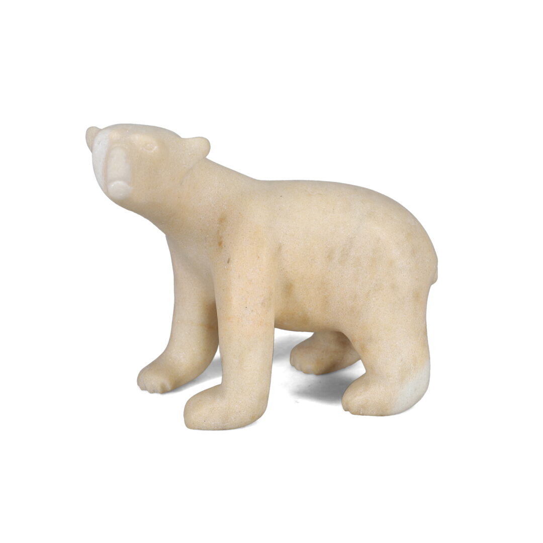 One original hand-carved sculpture by Inuit artist, Adamie Qummiaquk. One bear carved out of white marble.